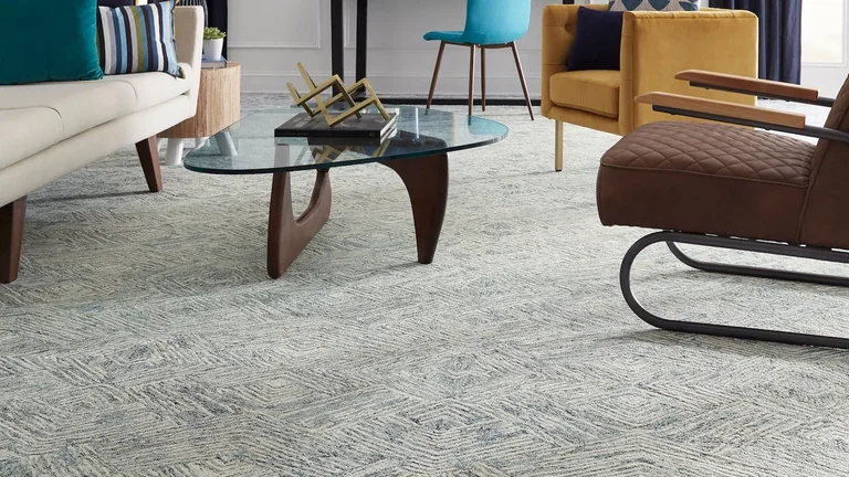Carpet care: how to vacuum, handle spills and reduce everyday wear Masland Palatial wool carpet in a furnished living room